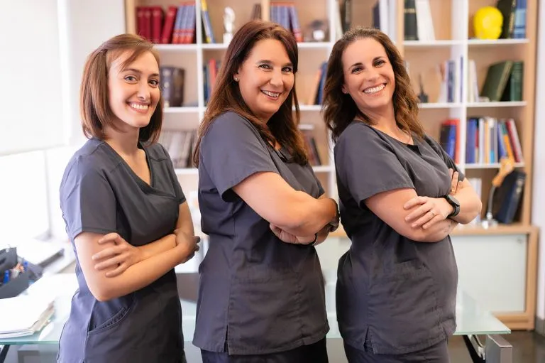 Equipo médico enfermeras clínica cirugía plástica